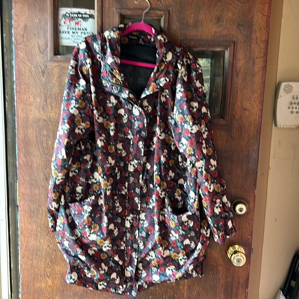 Skull and Roses Hooded Raincoat.